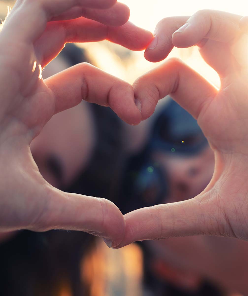 Best girlfriends making heart shaped hands